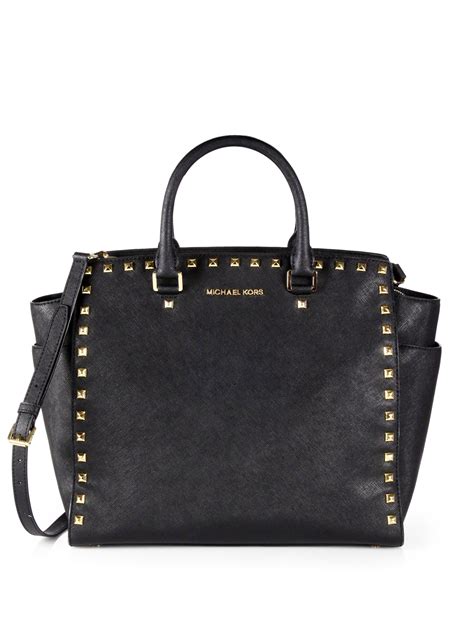 michael kors doctor bag black|Michael Kors black studded handbag.